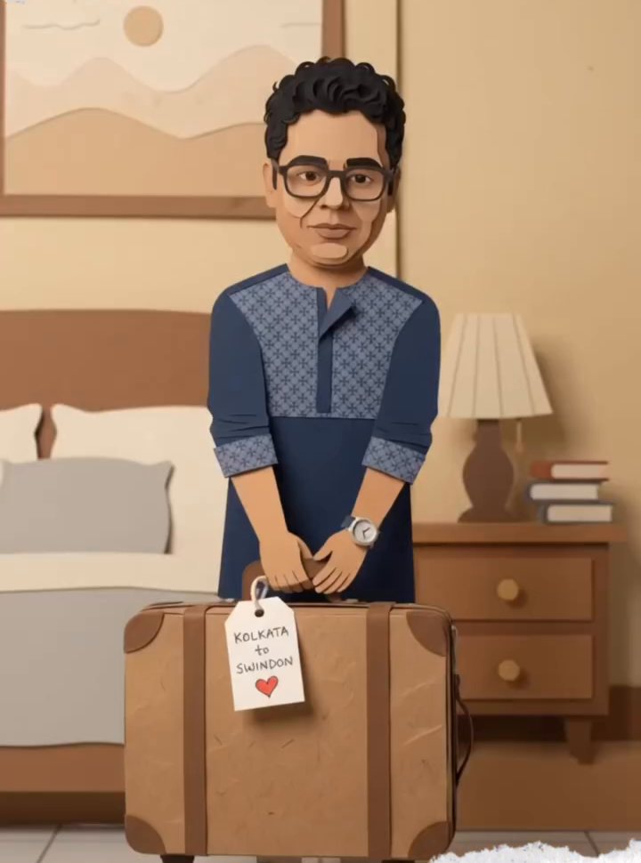 Papercraft Mir holding a suitcase tagged Kolkata to Swindon